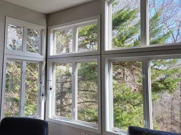 Clear great-room windows after fogged glass replacement.