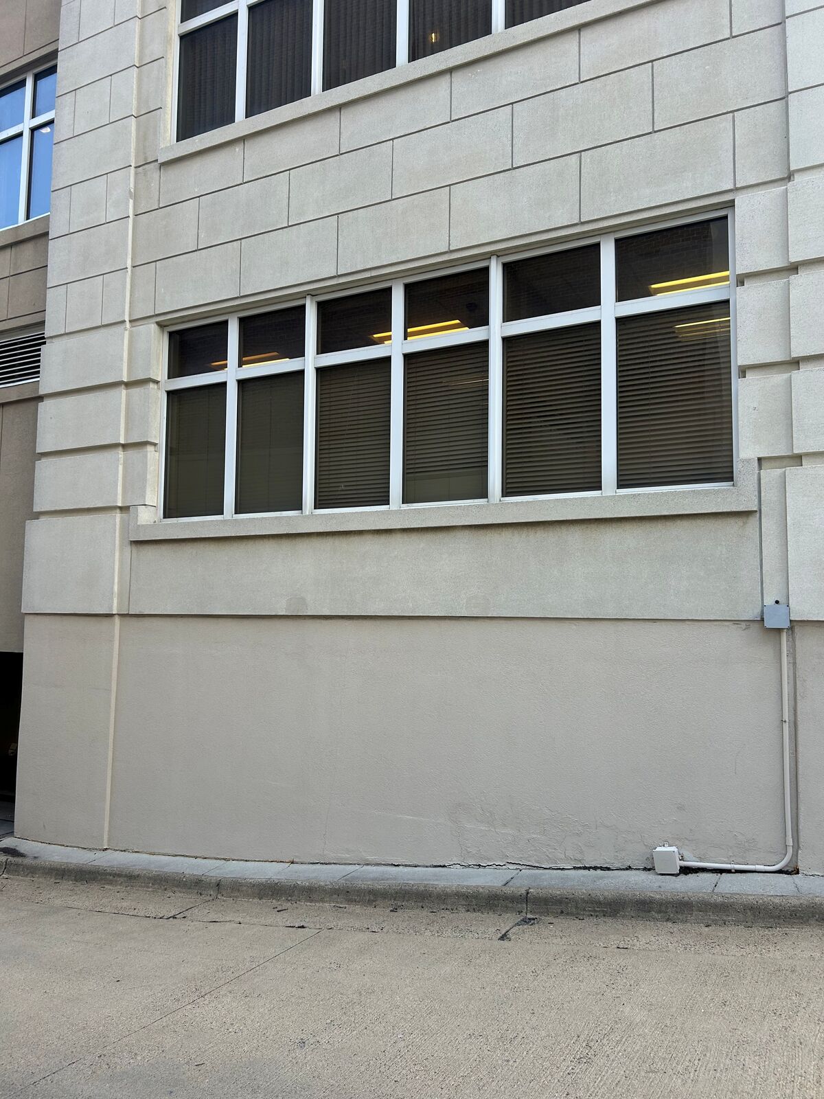 A band of windows across a commercial building exterior wall